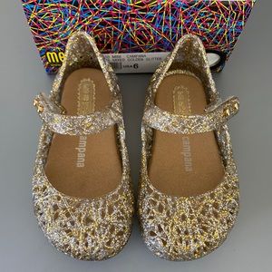 Mini Melissa gold shoes - excellent!
